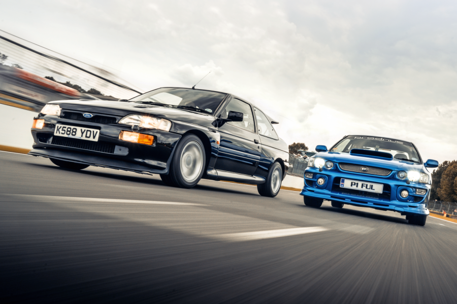 Classic & Sports Car - Black & Blue: Ford Escort RS Cosworth vs Subaru Impreza P1